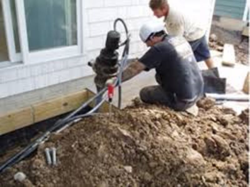 men digging a hole